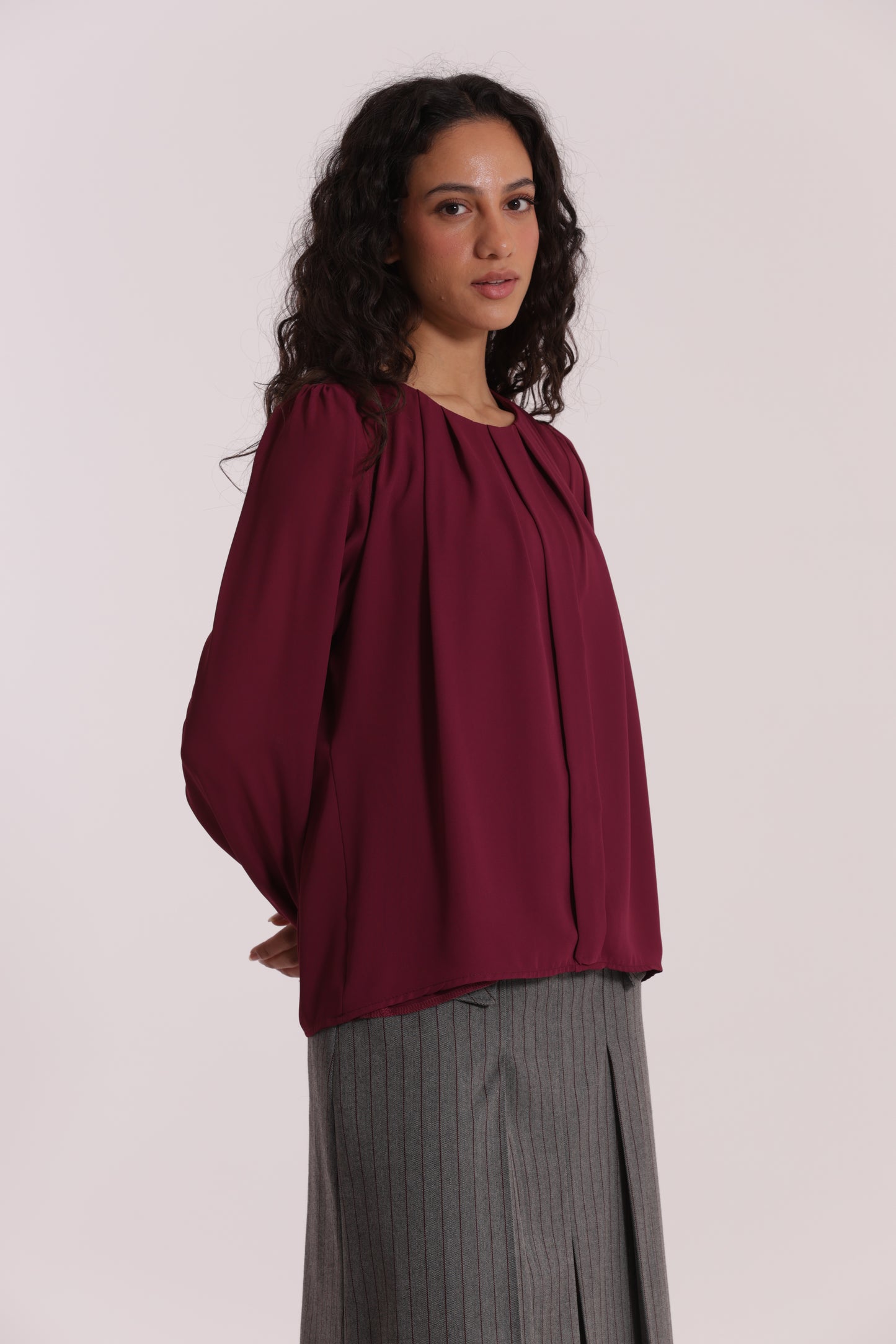 BLUSA CON PIEGHE