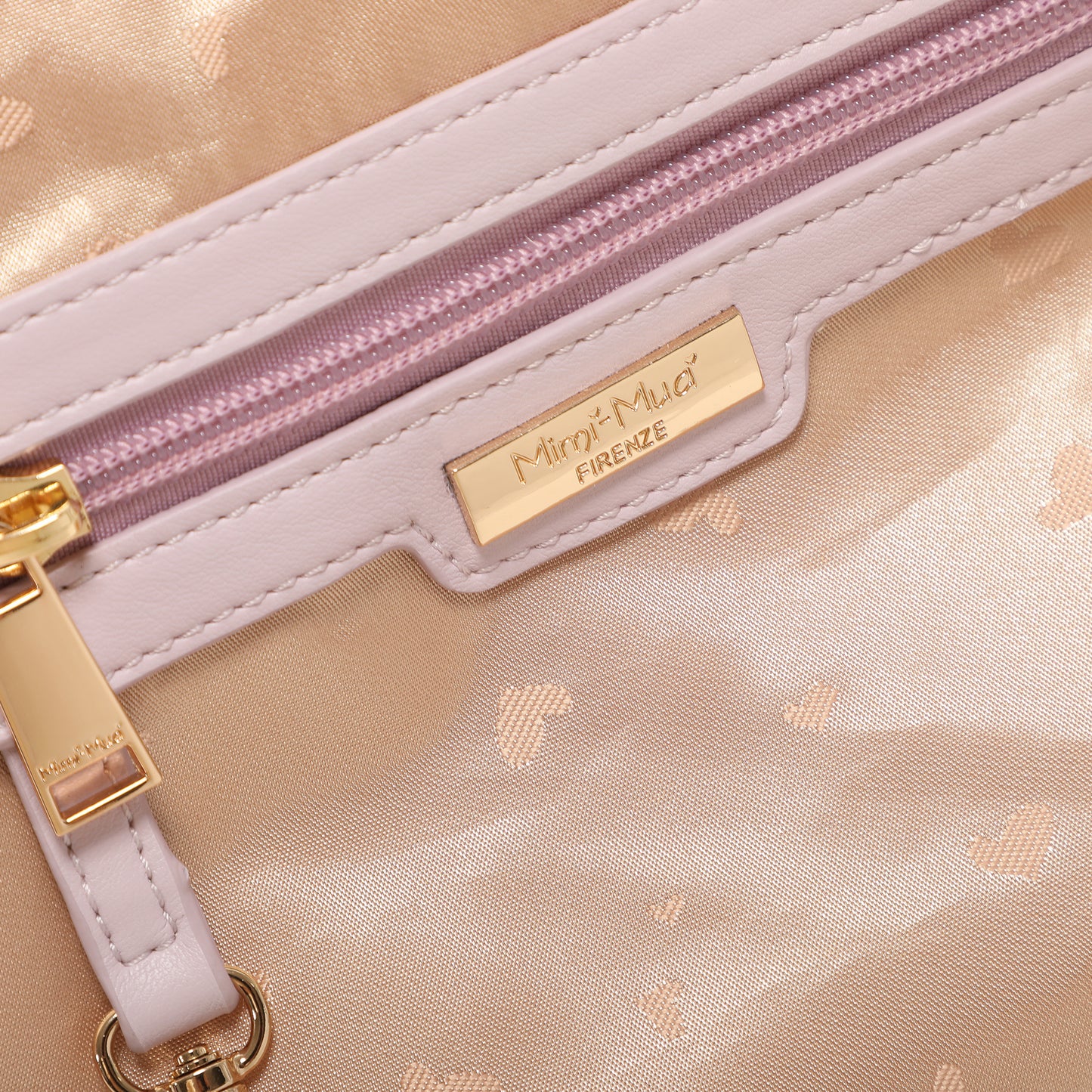 BORSA A TRACOLLA CON MOTIVO TRAFORATO