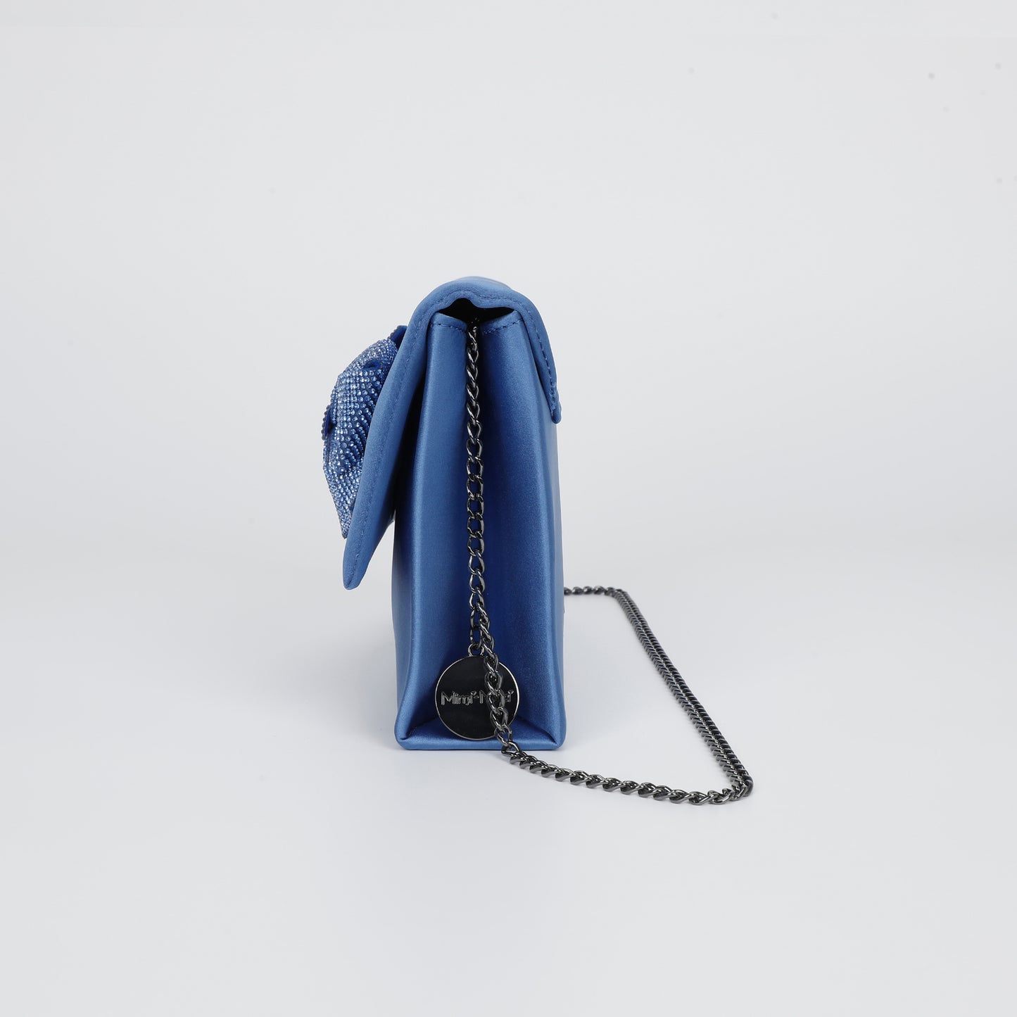 BORSA CON FIOCCO DI STRASS ASIMMETRICO