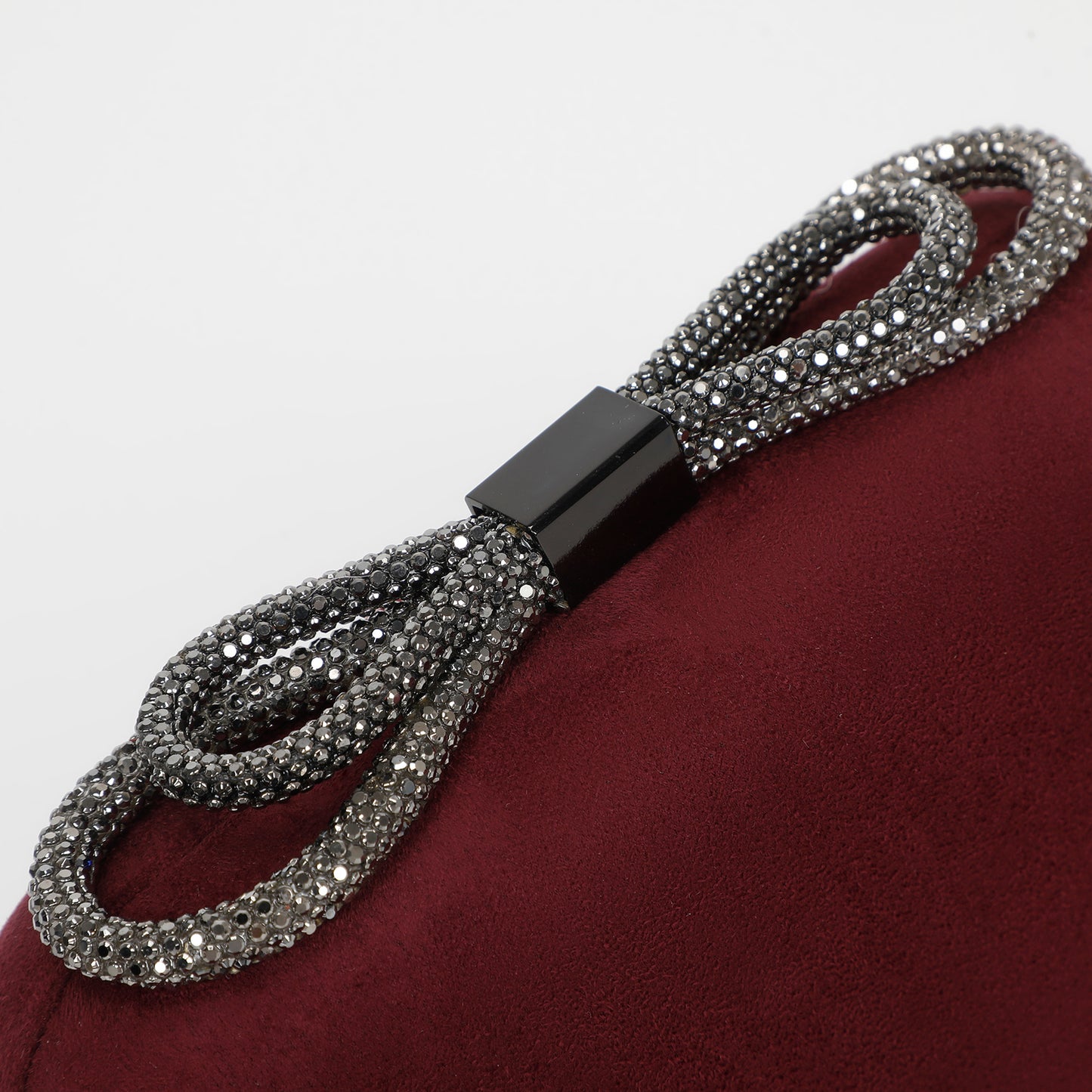 BORSA CLUTCH EFFETTO CAMOSCIO CON CHIUSURA A FIOCCO