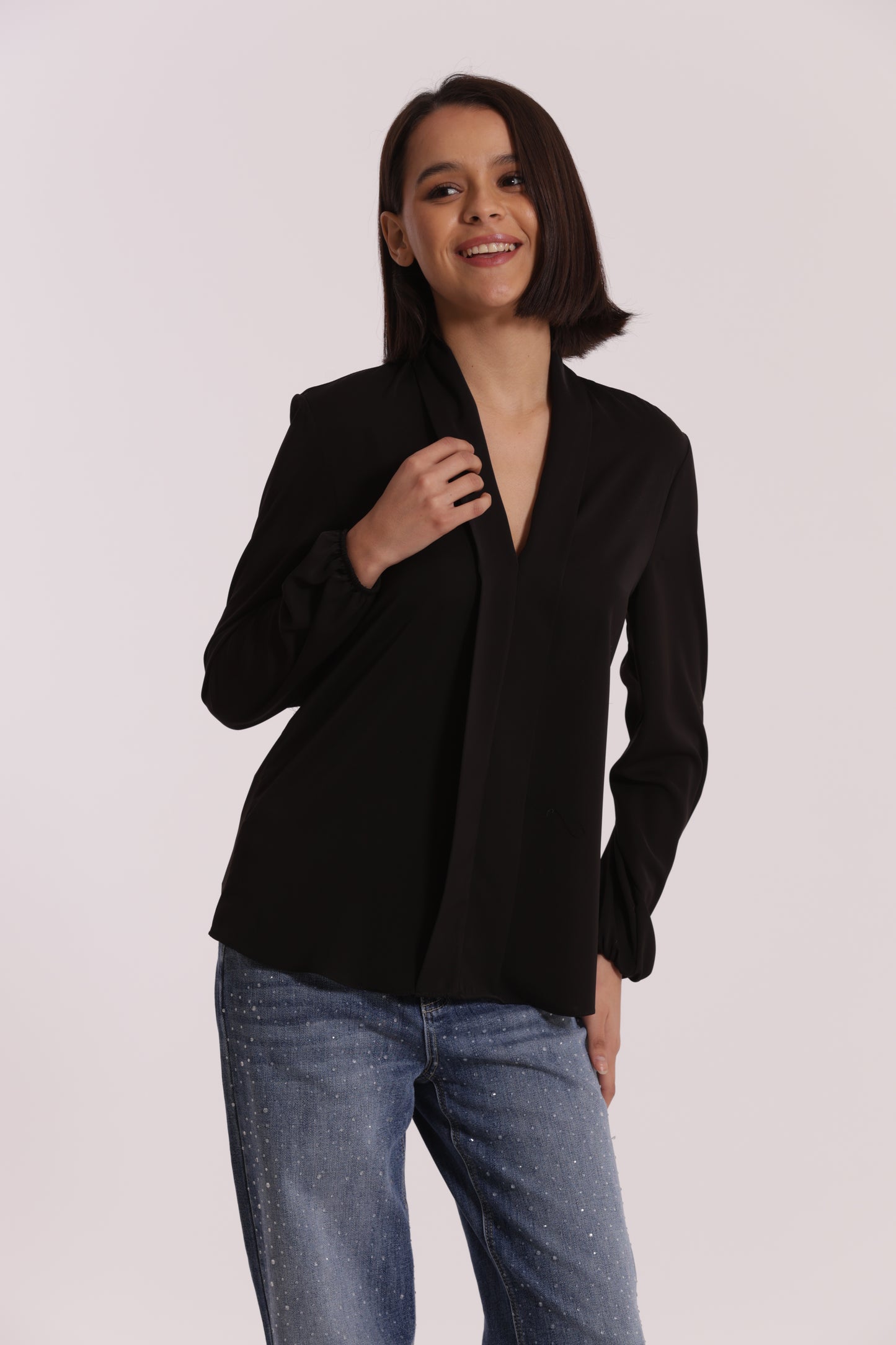 BLUSA CON PIEGHE IN SOLTON