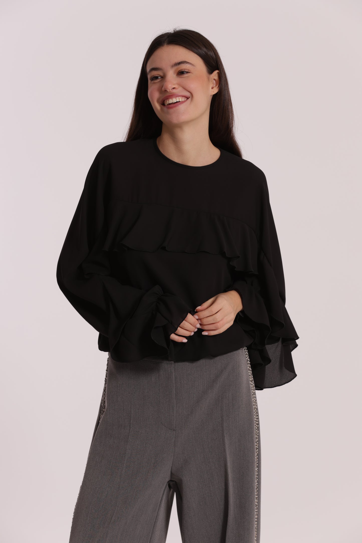 BLUSA CON ROUCHES
