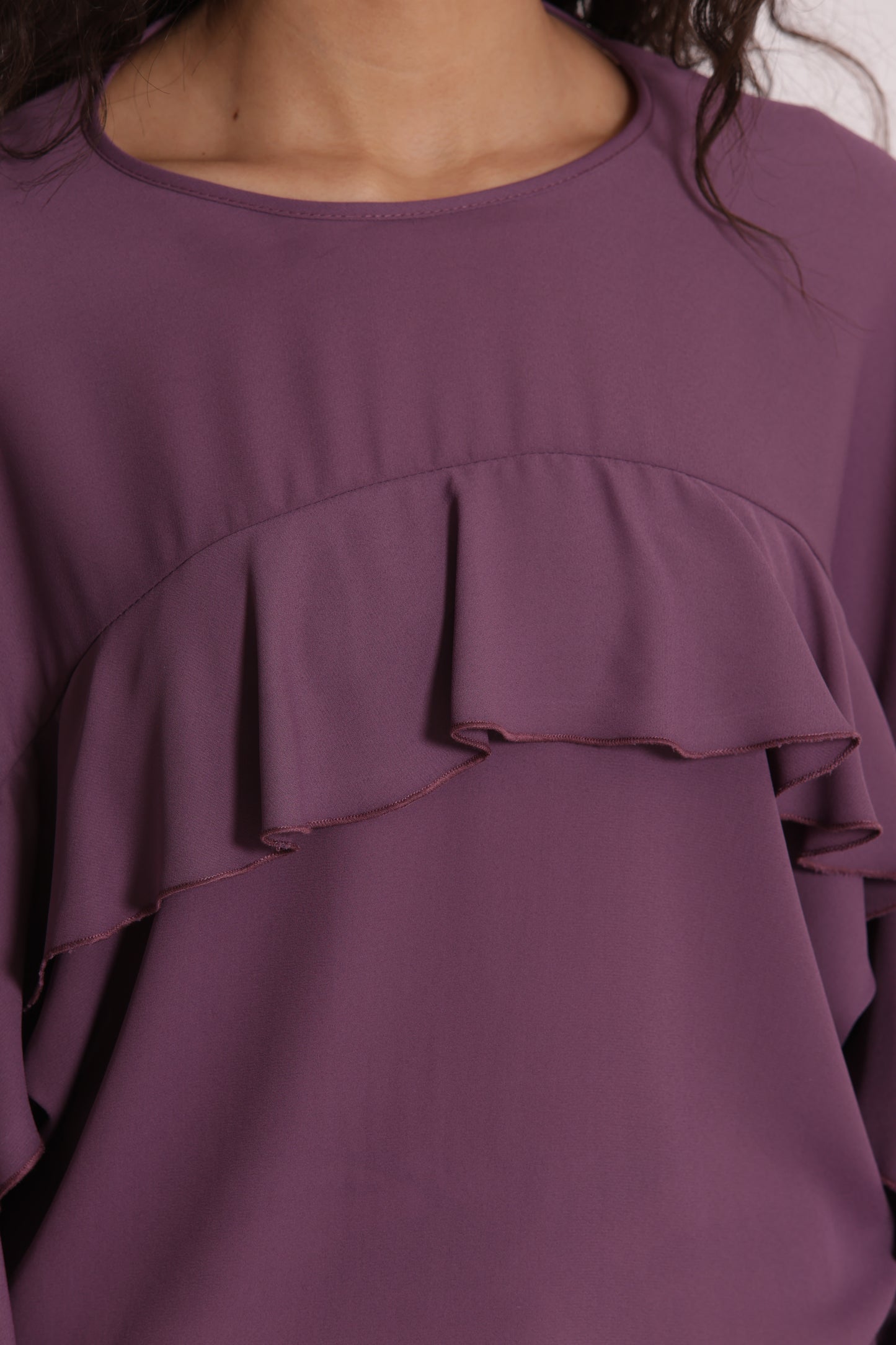 BLUSA CON ROUCHES