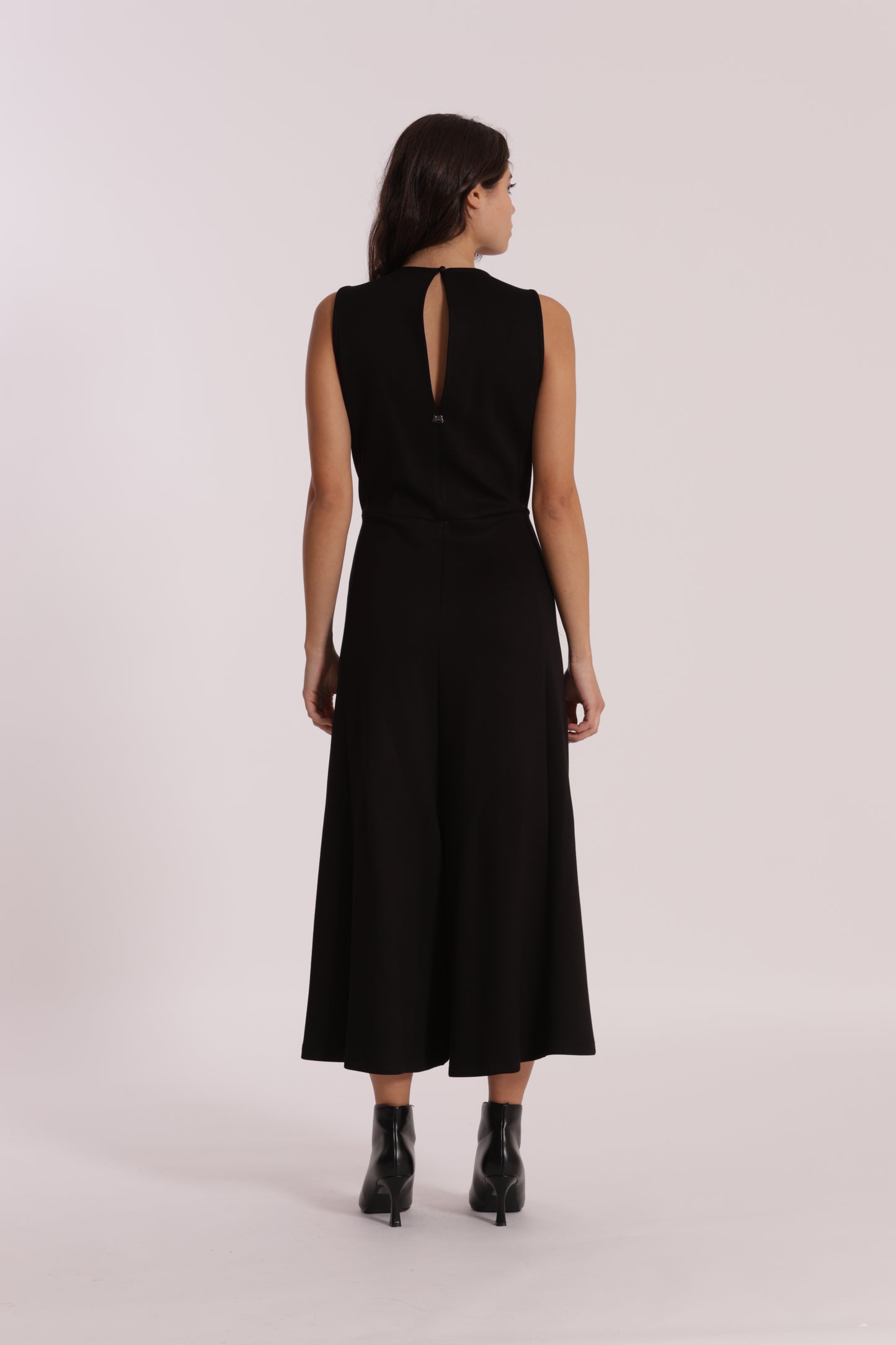 TUTA IN NEOPRENE CON FIORE