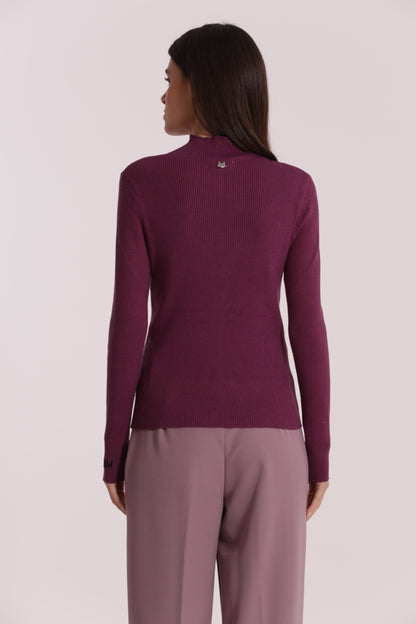 MAGLIA CON RICAMO SUL POLSO