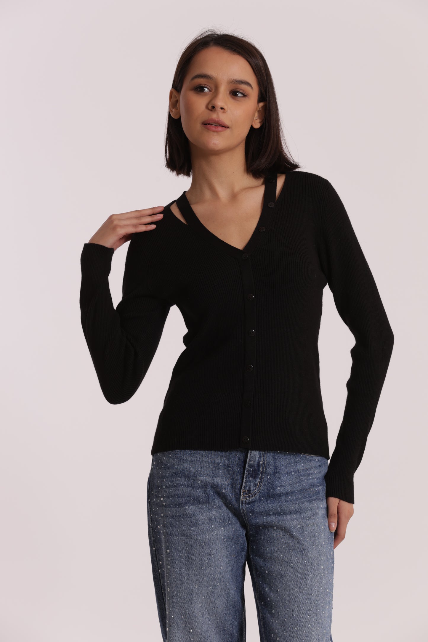MAGLIA CUT OUT CON DETTAGLIO BOTTONI