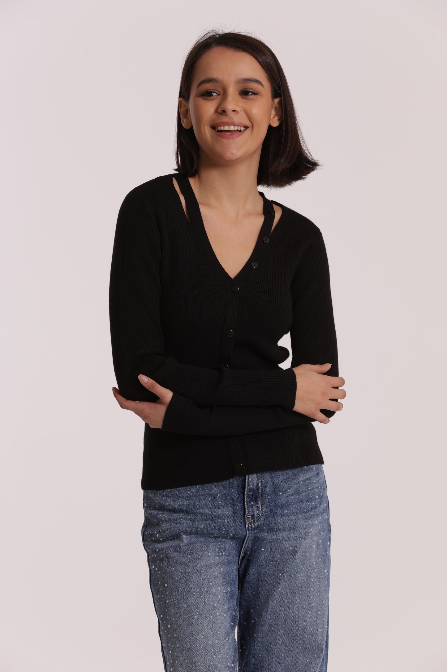 MAGLIA CUT OUT CON DETTAGLIO BOTTONI