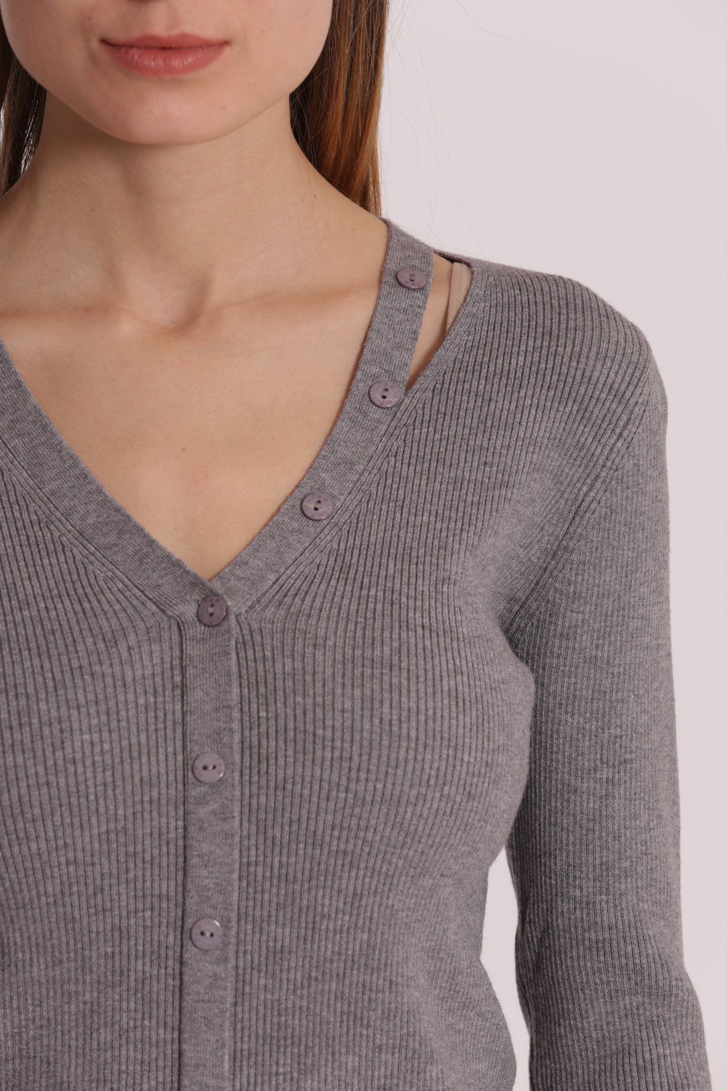 MAGLIA CUT OUT CON DETTAGLIO BOTTONI