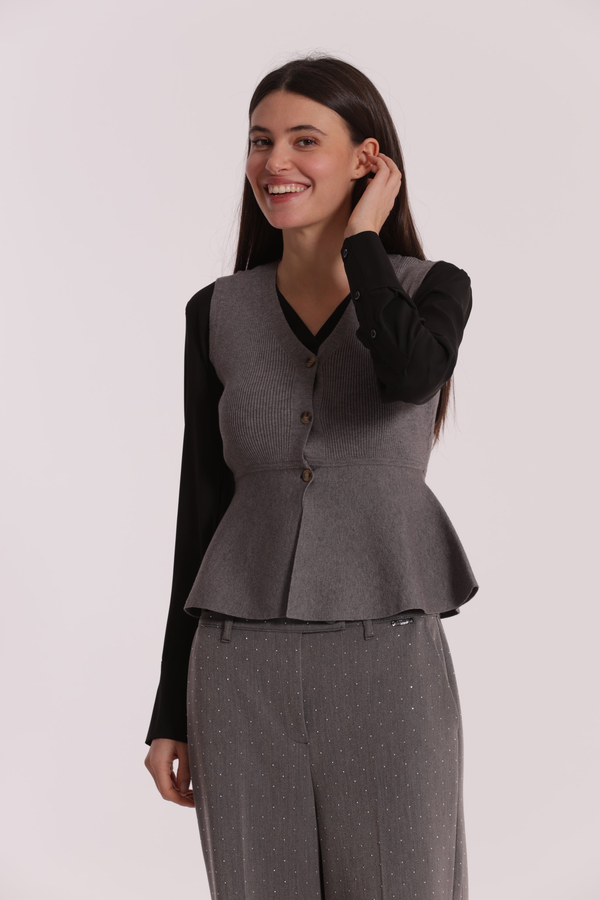 GILET IN MAGLIA SVASATO SUL FONDO CON BOTTONI