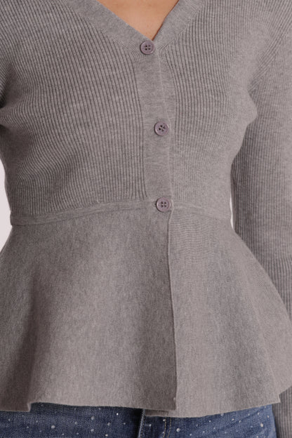 MAGLIA CARDIGAN SVASATO SUL FONDO CON BOTTONI