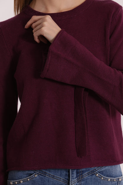 MAGLIA SCOLLO TONDO CON FIOCCHI SULLA MANICA