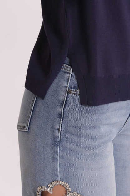 MAGLIA A MANICHE LUNGHE CON BOTTONI SU SPALLA