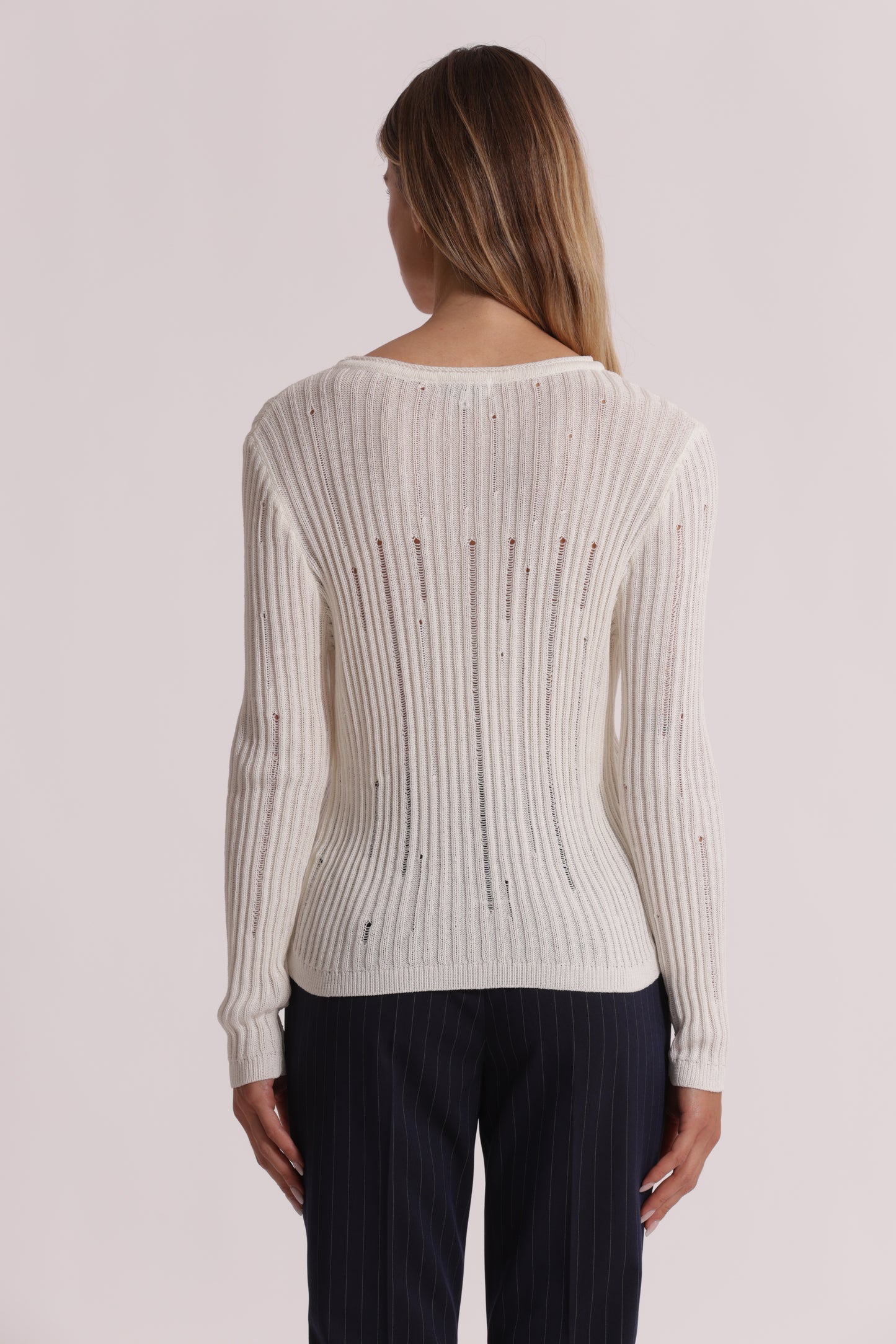 MAGLIA CON DETTAGLI SMAGLIATI