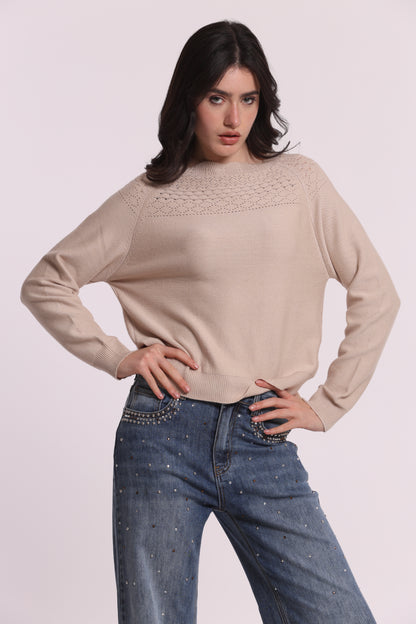 MAGLIA CON DETTAGLI TRAFORATI