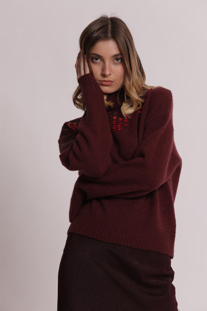 MAGLIA COLLO ALTO CON CASCATE DI PAILLETTES