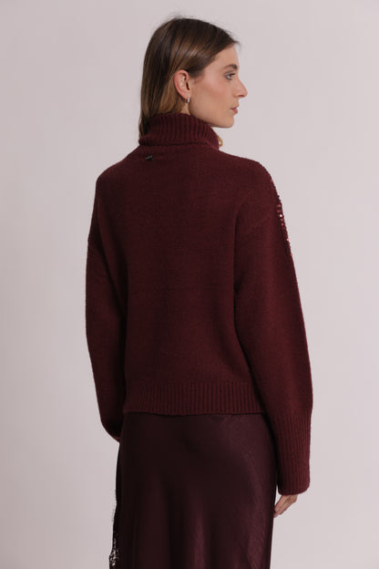 MAGLIA COLLO ALTO CON CASCATE DI PAILLETTES
