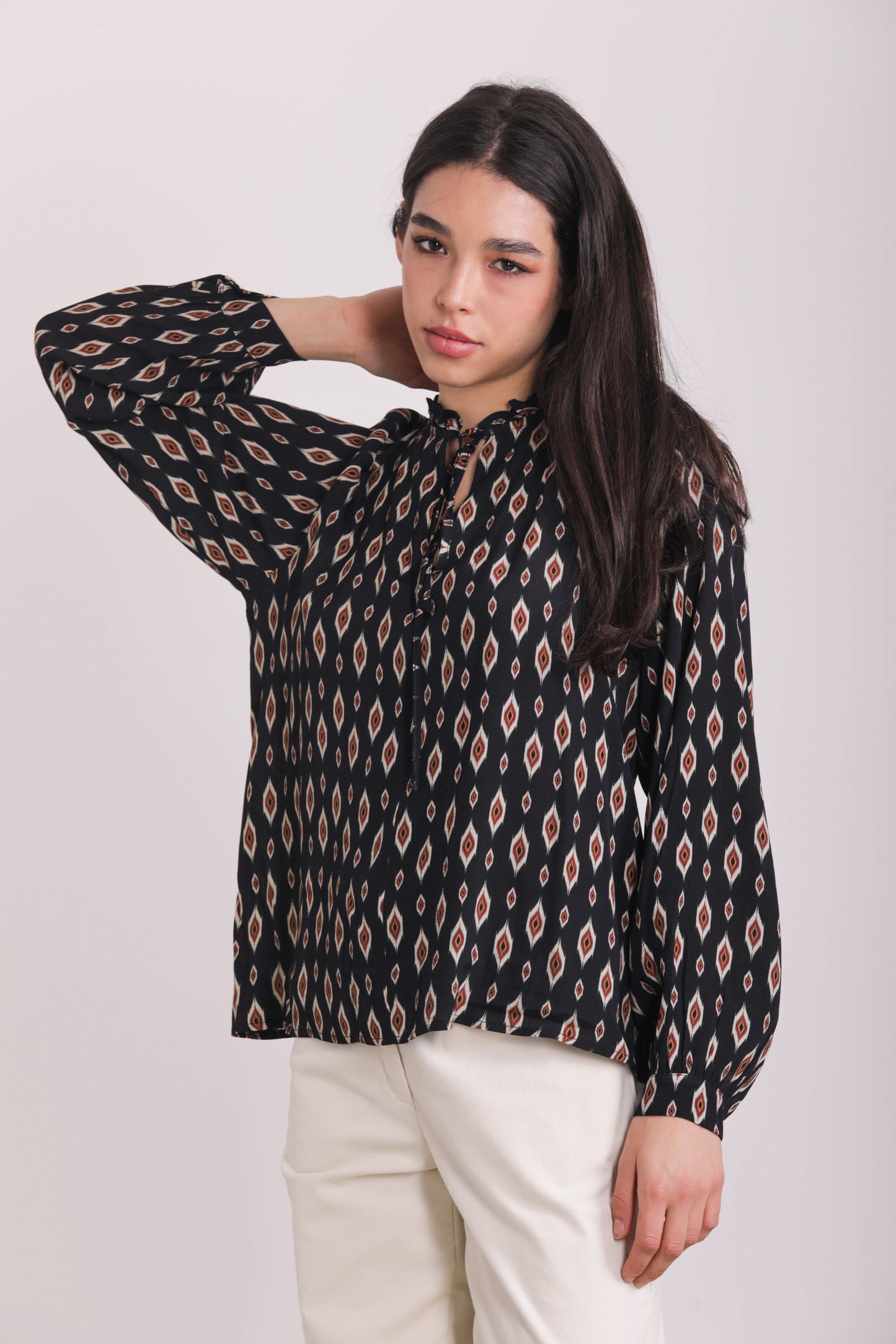 BLUSA CON ROUCHES FANTASIA ROMBI STILIZZATI