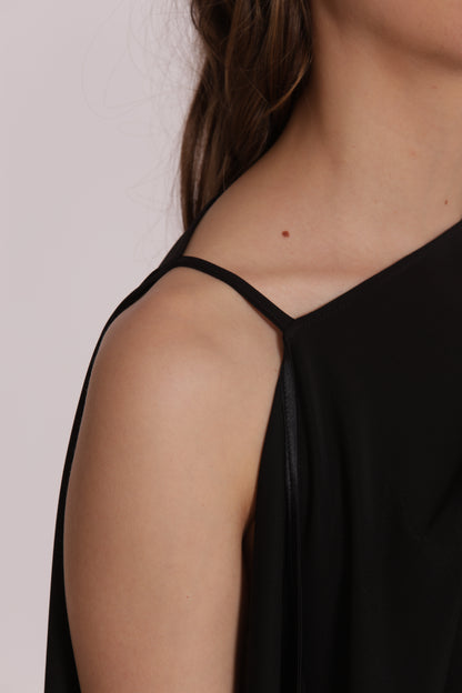 BLUSA CON SPALLA SCESA