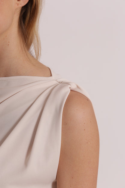 BLUSA CON SPALLA SCESA