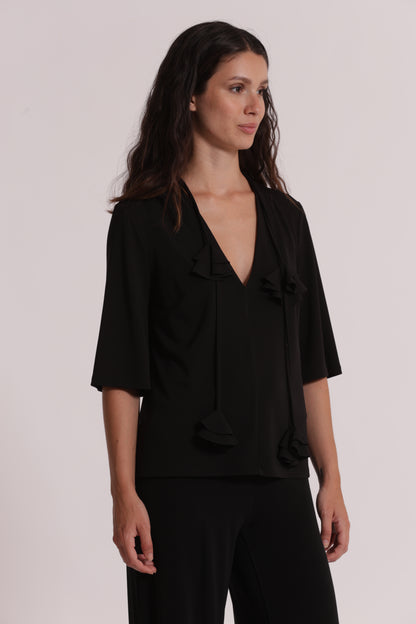 BLUSA CON SCOLLO A V E DETTAGLIO FLOREALE