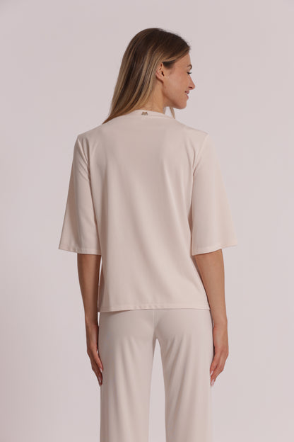 BLUSA CON SCOLLO A V E DETTAGLIO FLOREALE