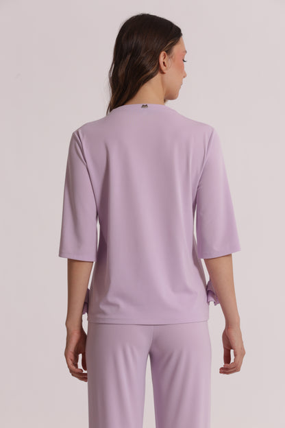 BLUSA CON SCOLLO A V E DETTAGLIO FLOREALE