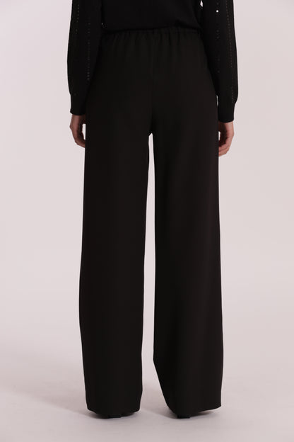 PANTALONE PALAZZO CON ELASTICO DIETRO IN TESSUTO TECNICO