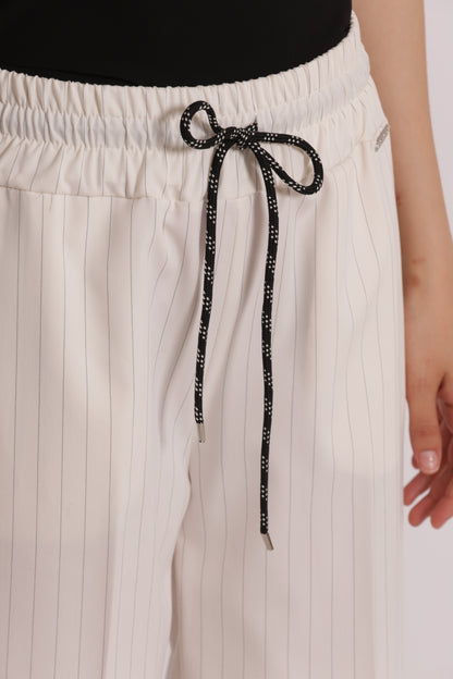 PANTALONE CROPPED CON ELASTICO IN VITA GESSATO