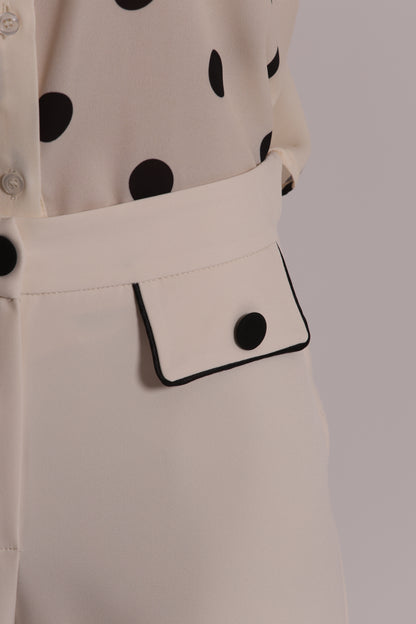 PANTALONE CON BORDI A CONTRASTO