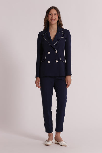 PANTALONE CON BOTTONE A CONTRASTO