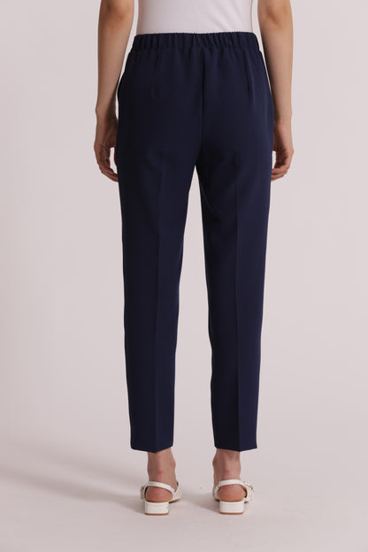 PANTALONE CON BOTTONE A CONTRASTO