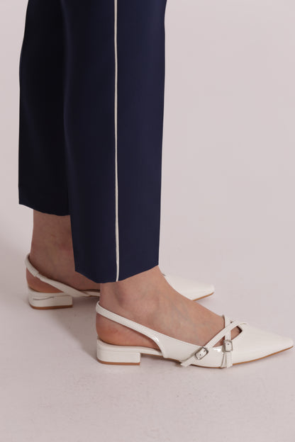 PANTALONE CON BOTTONE A CONTRASTO