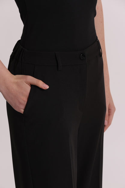PANTALONE PALAZZO CON ELASTICO DIETRO IN TESSUTO TECNICO