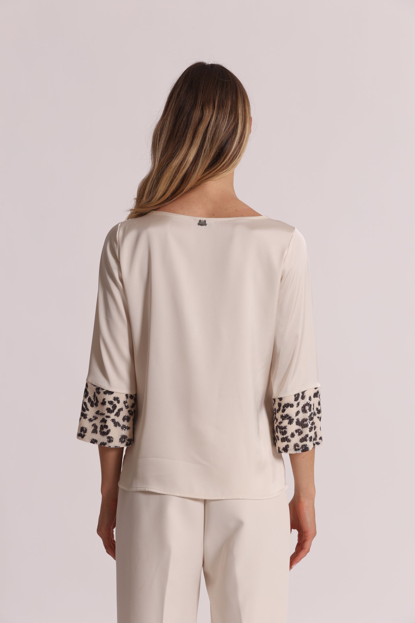 BLUSA CON PAILLETTES IN FANTASIA ANIMALIER