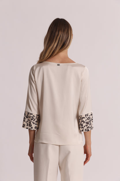 BLUSA CON PAILLETTES IN FANTASIA ANIMALIER