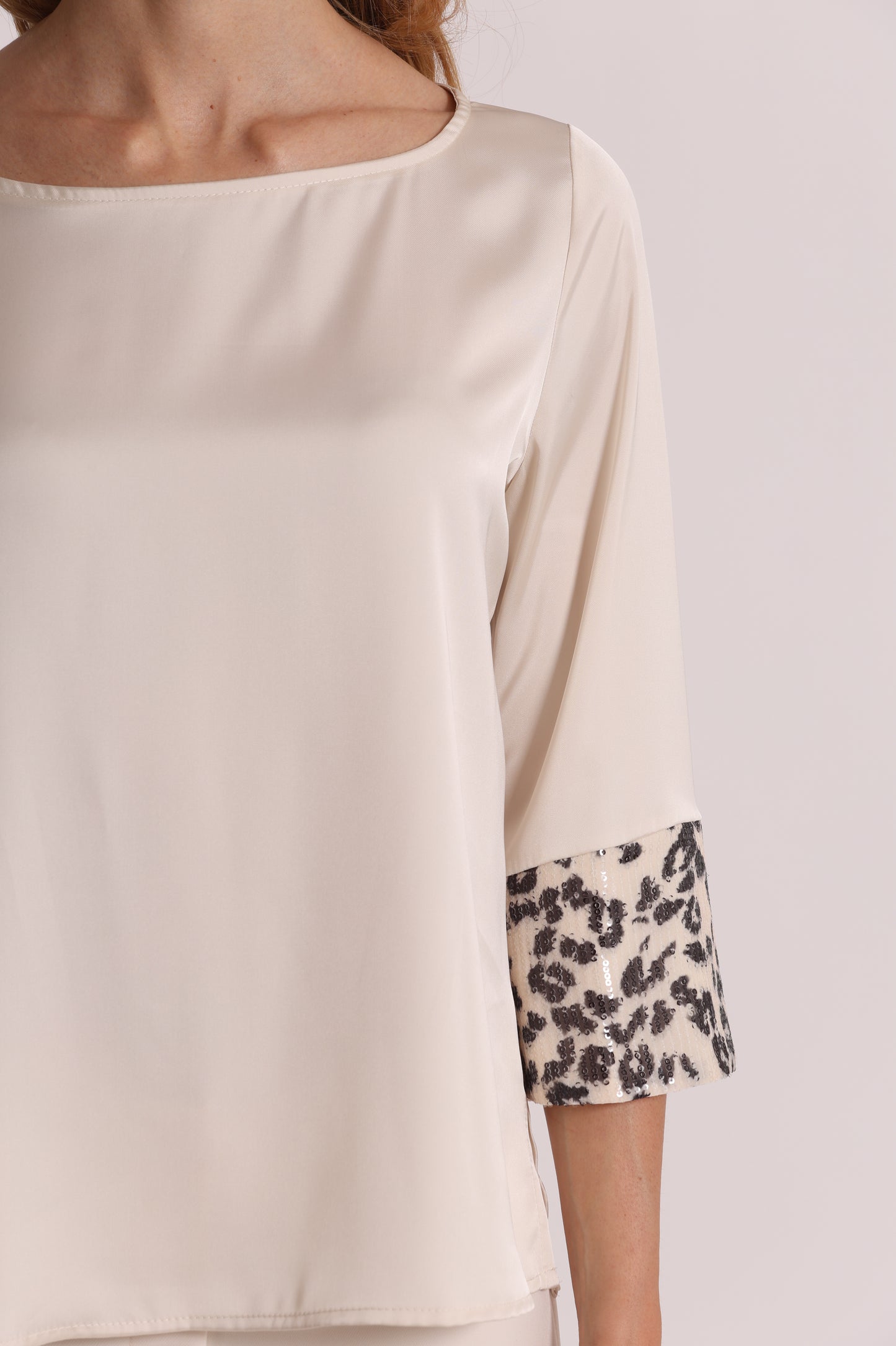 BLUSA CON PAILLETTES IN FANTASIA ANIMALIER