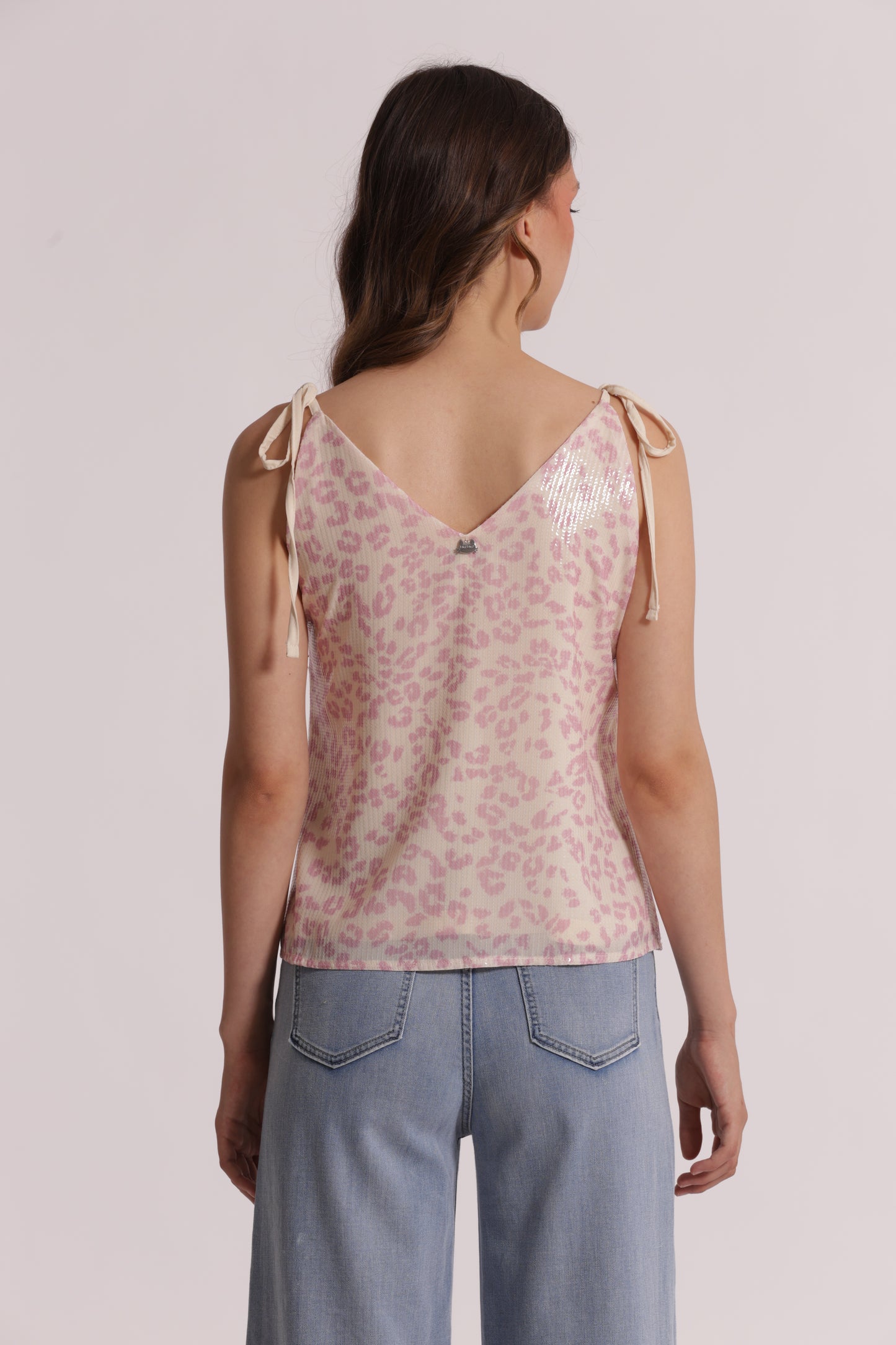 TOP CON PAILLETTES IN FANTASIA ANIMALIER