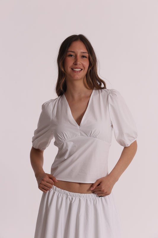 BLUSA CROPPED CON SCOLLO A V