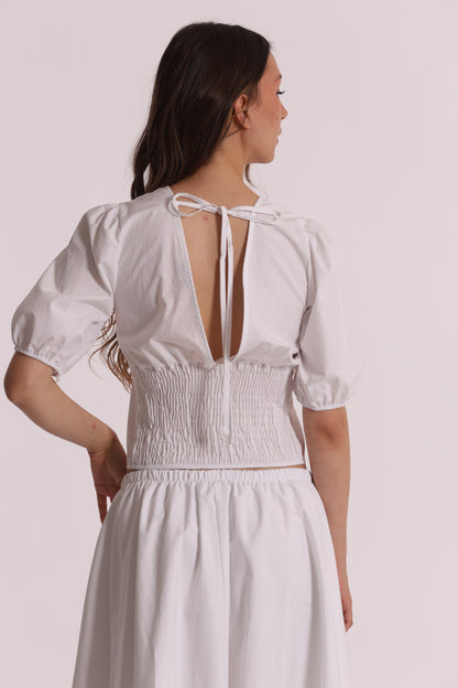 BLUSA CROPPED CON SCOLLO A V