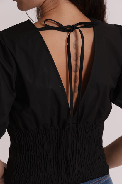 BLUSA CROPPED CON SCOLLO A V