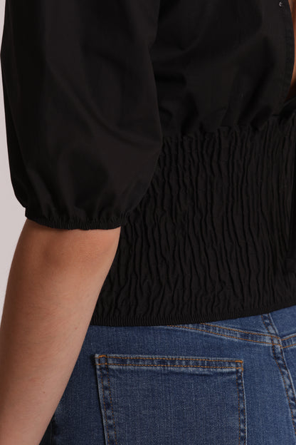 BLUSA CROPPED CON SCOLLO A V
