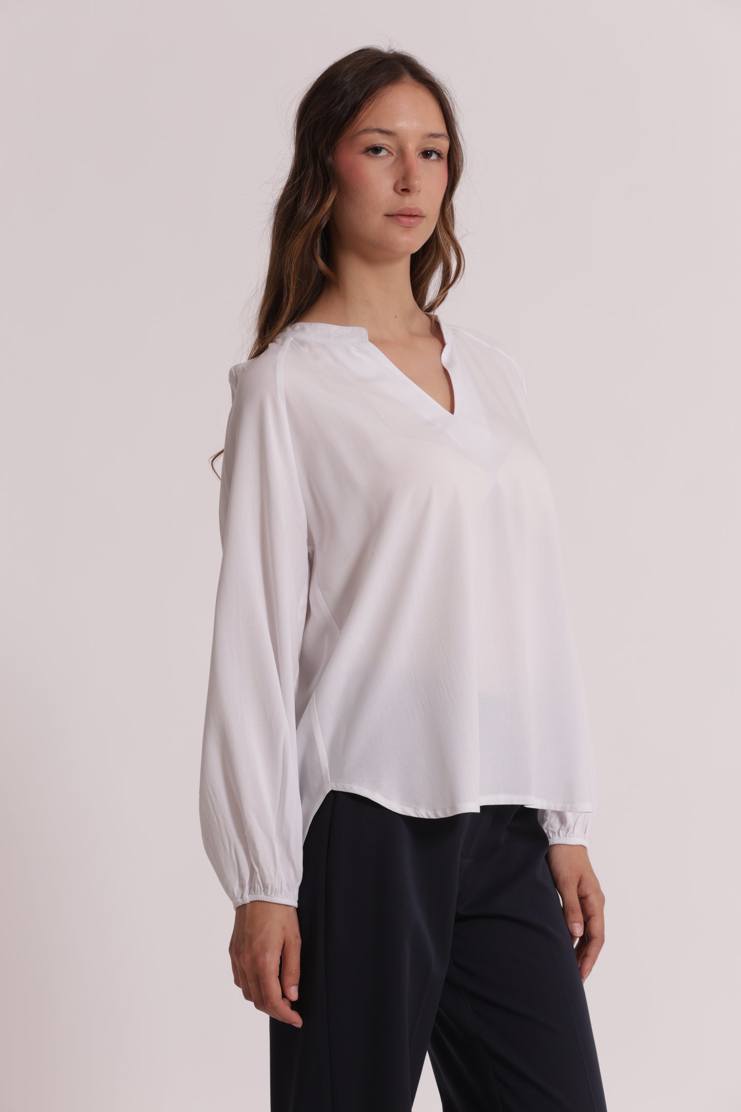 BLUSA A MANICHE LUNGHE TINTA UNITA