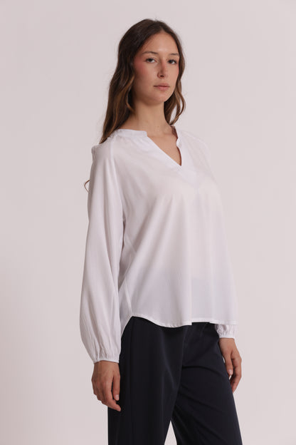 BLUSA A MANICHE LUNGHE TINTA UNITA