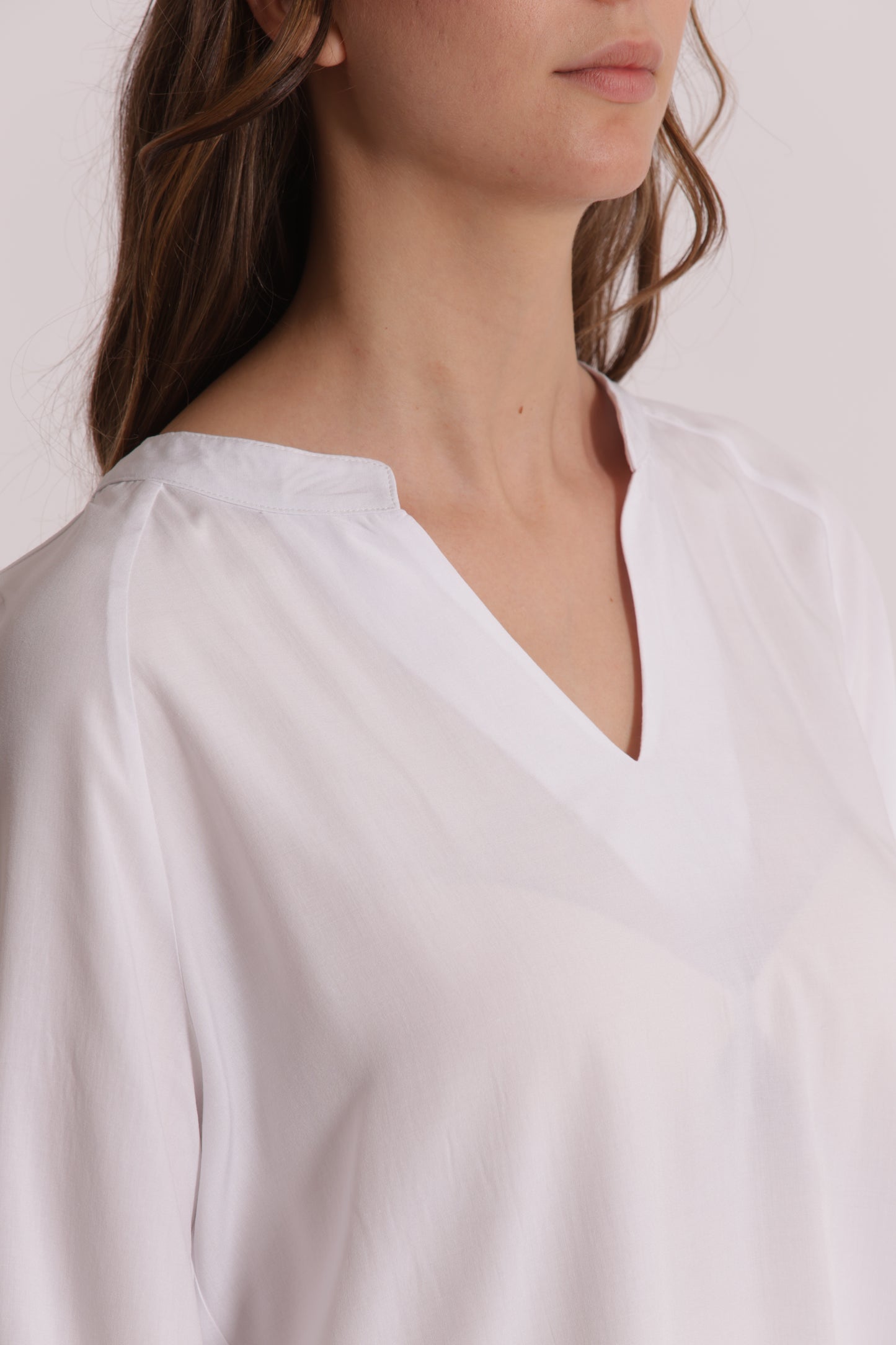 BLUSA A MANICHE LUNGHE TINTA UNITA