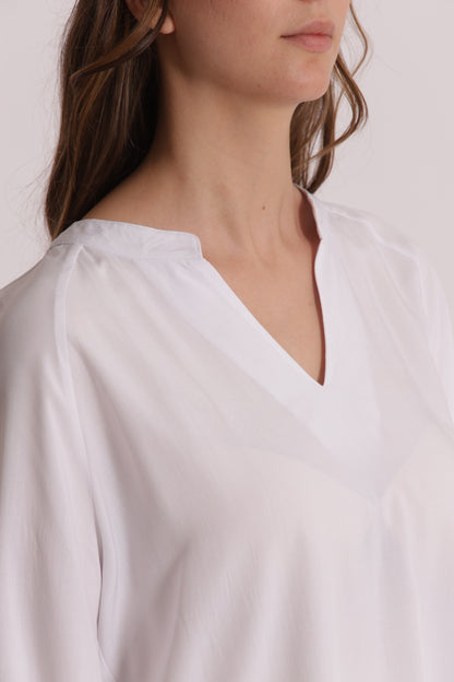 BLUSA A MANICHE LUNGHE TINTA UNITA