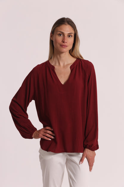 BLUSA A MANICHE LUNGHE TINTA UNITA