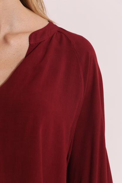 BLUSA A MANICHE LUNGHE TINTA UNITA