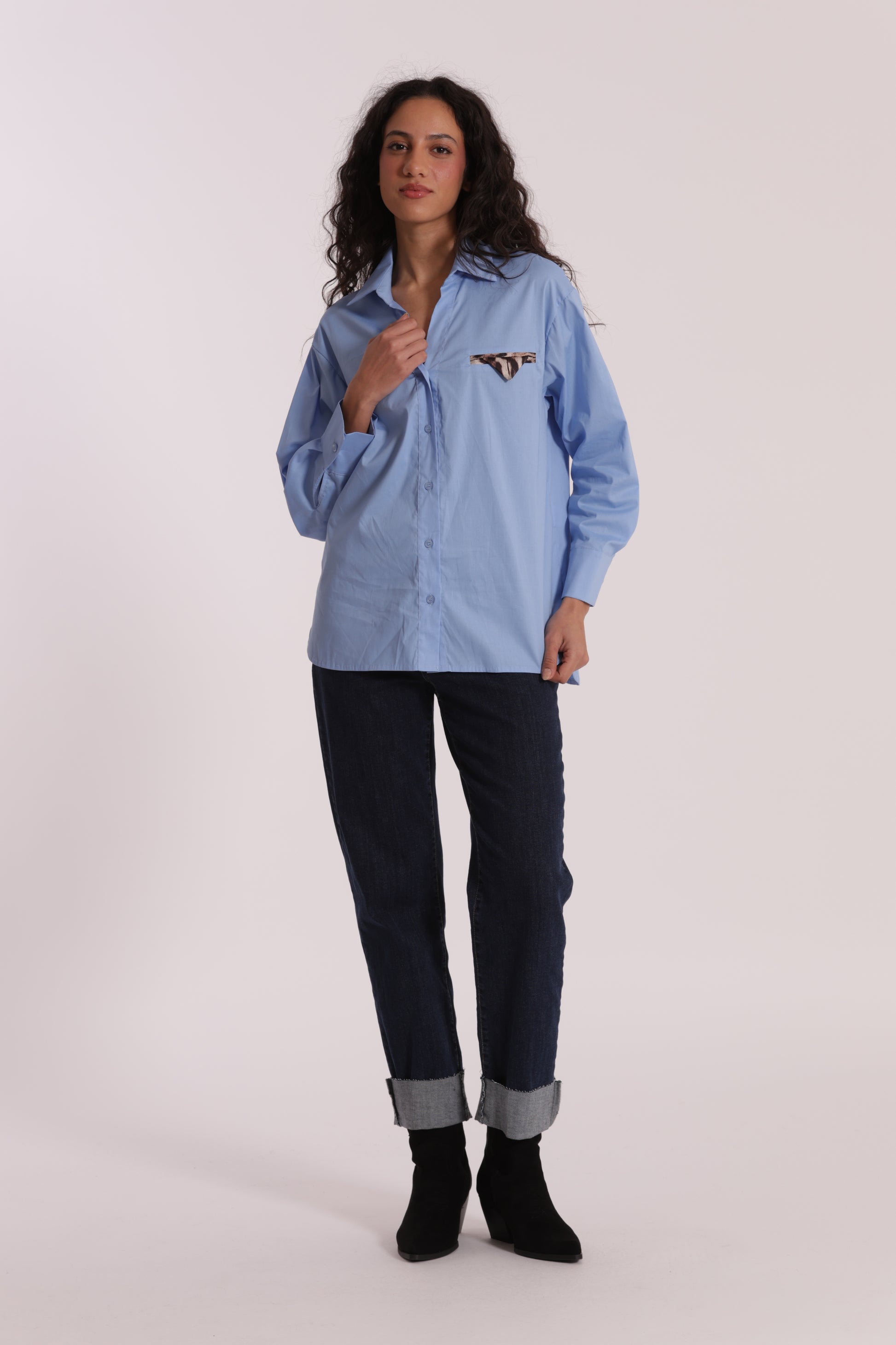 JEANS CROPPED CON RIVOLTO