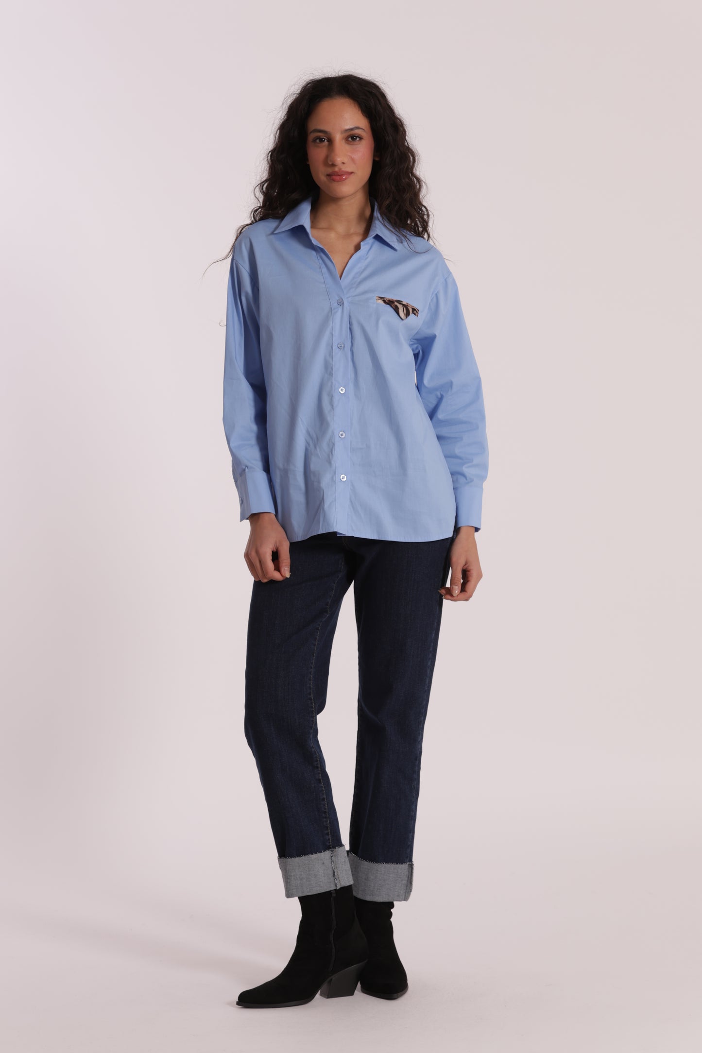 JEANS CROPPED CON RIVOLTO