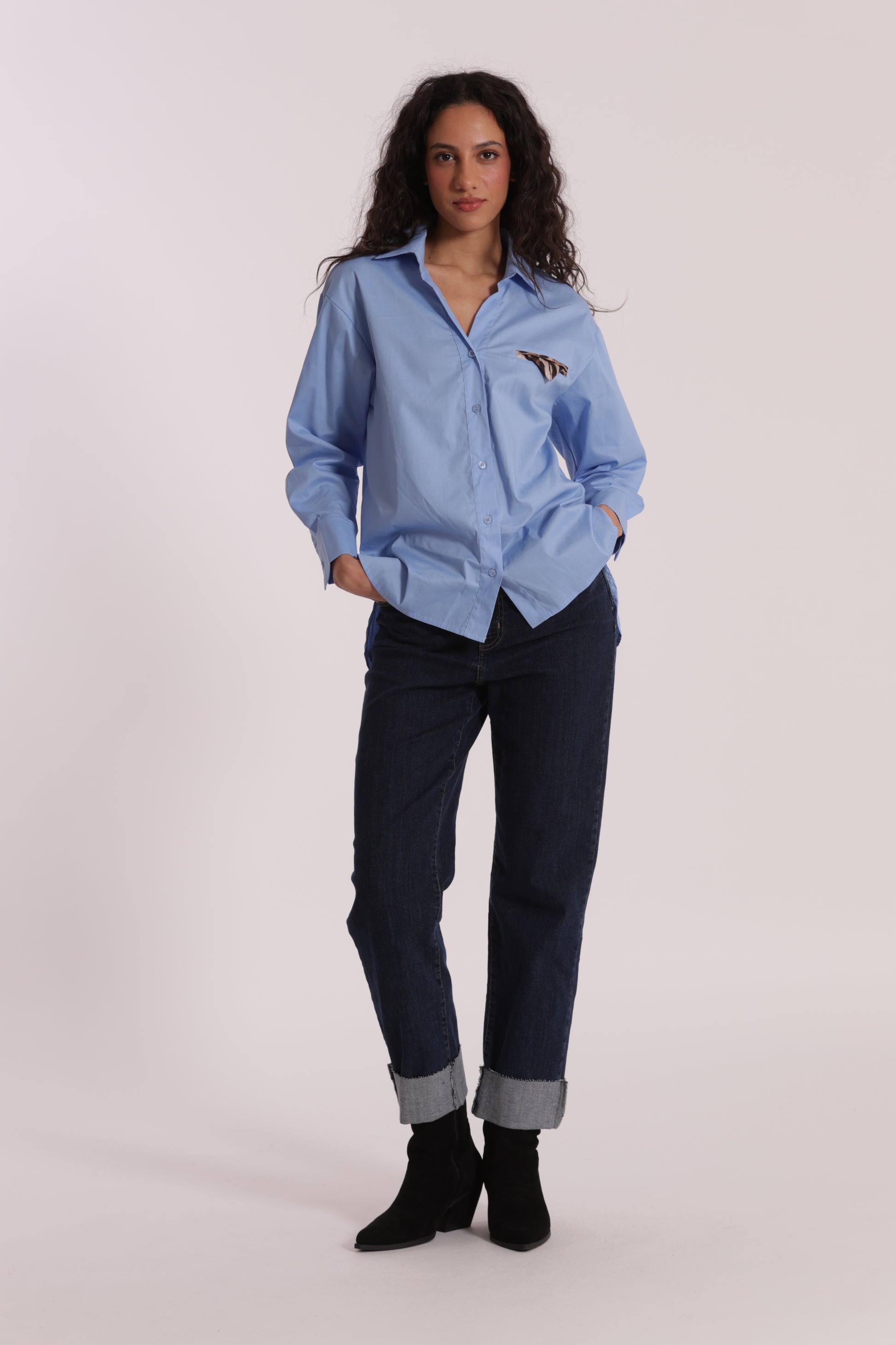 JEANS CROPPED CON RIVOLTO